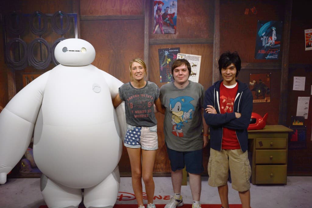 Bethany Jackson and Ryan Fitton with Baymax and Hrio from Big Hero 6 at Walt Disney World